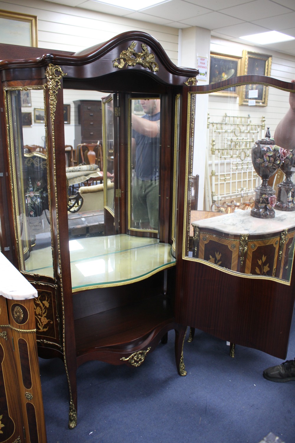 A Meuble Francais marquetry inlaid serpentine vitrine, W.94cm D.40cm  H.180cm